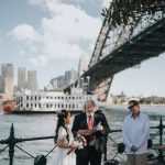 Saying vows beside the water